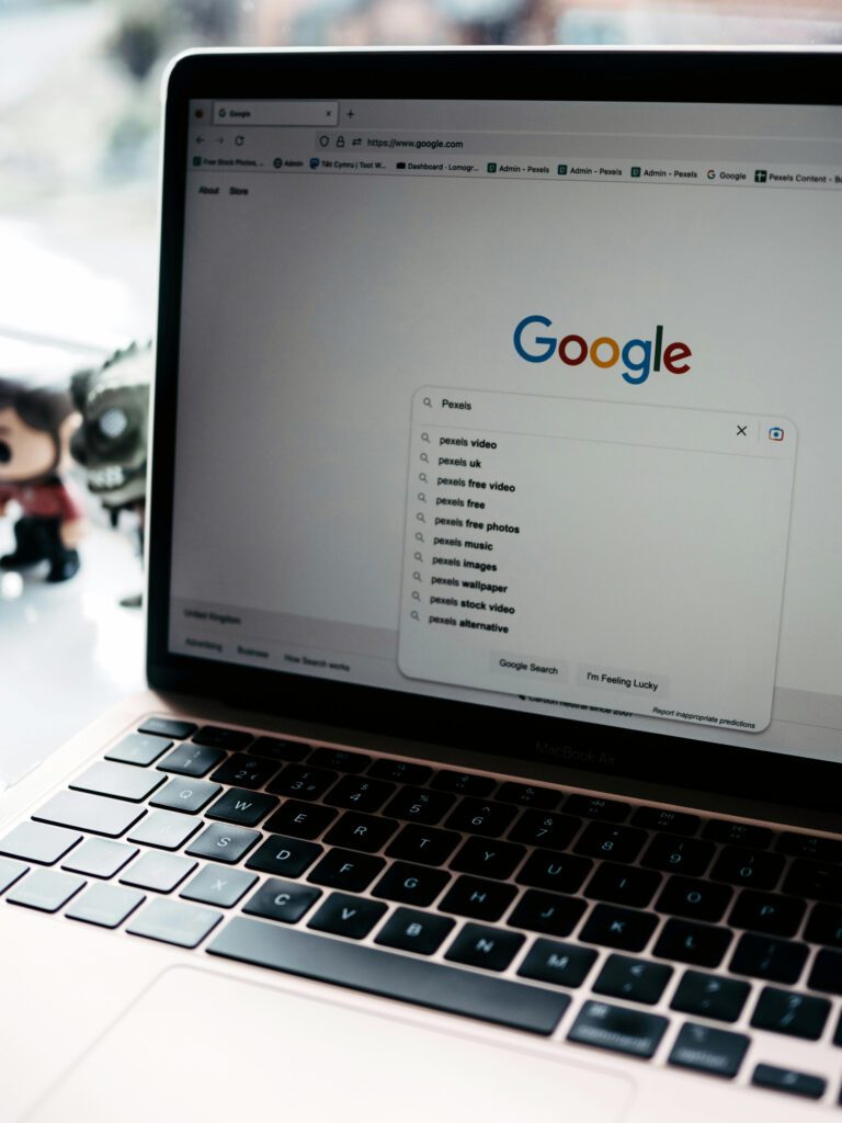 Photo of a Laptop Screen with Google Main Page on It